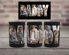 Three black neoprene can coolers displayed on a wooden surface with a blurred brick wall background. Above them is a black rectangular template showing the custom photo filled 'DADDY' lettering design.