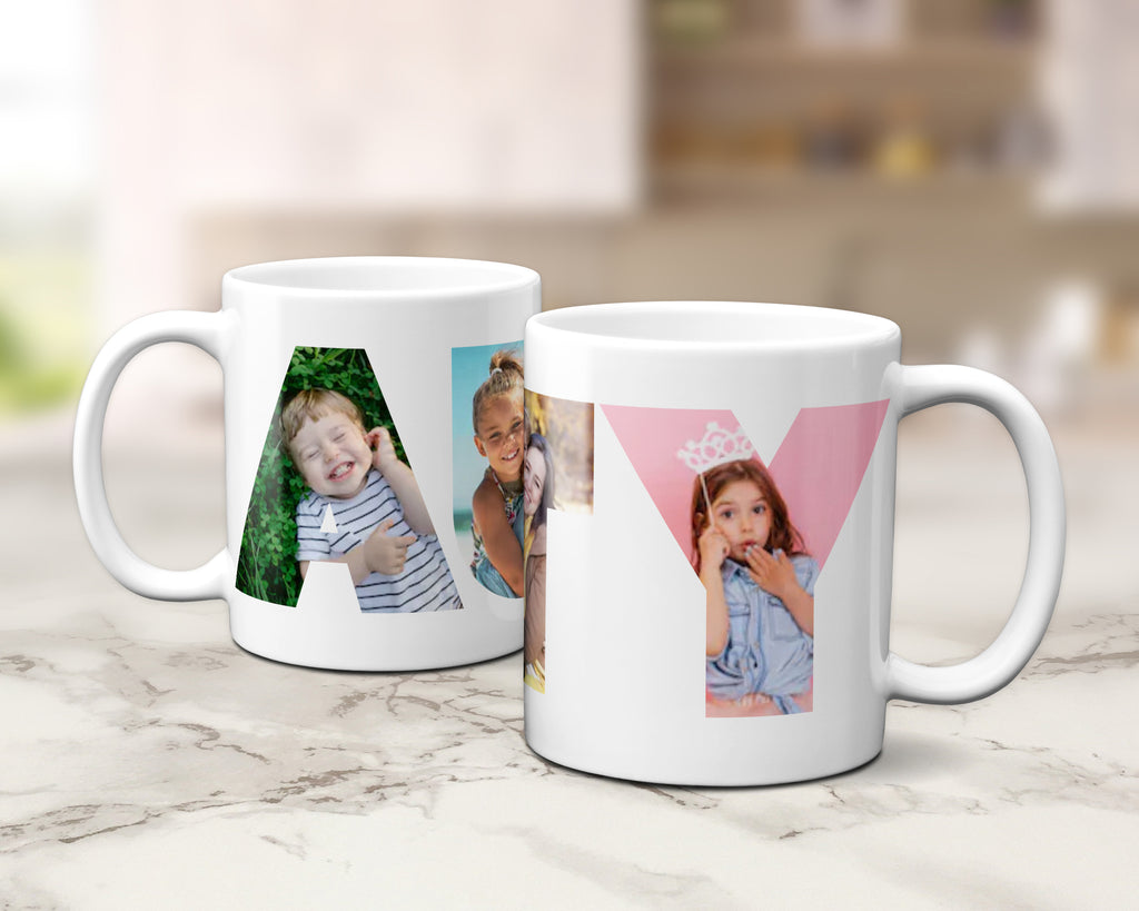 Two white ceramic mugs with custom photo filled letters 'AUNTY' designs, displayed on a light marble countertop with a blurred kitchen background.