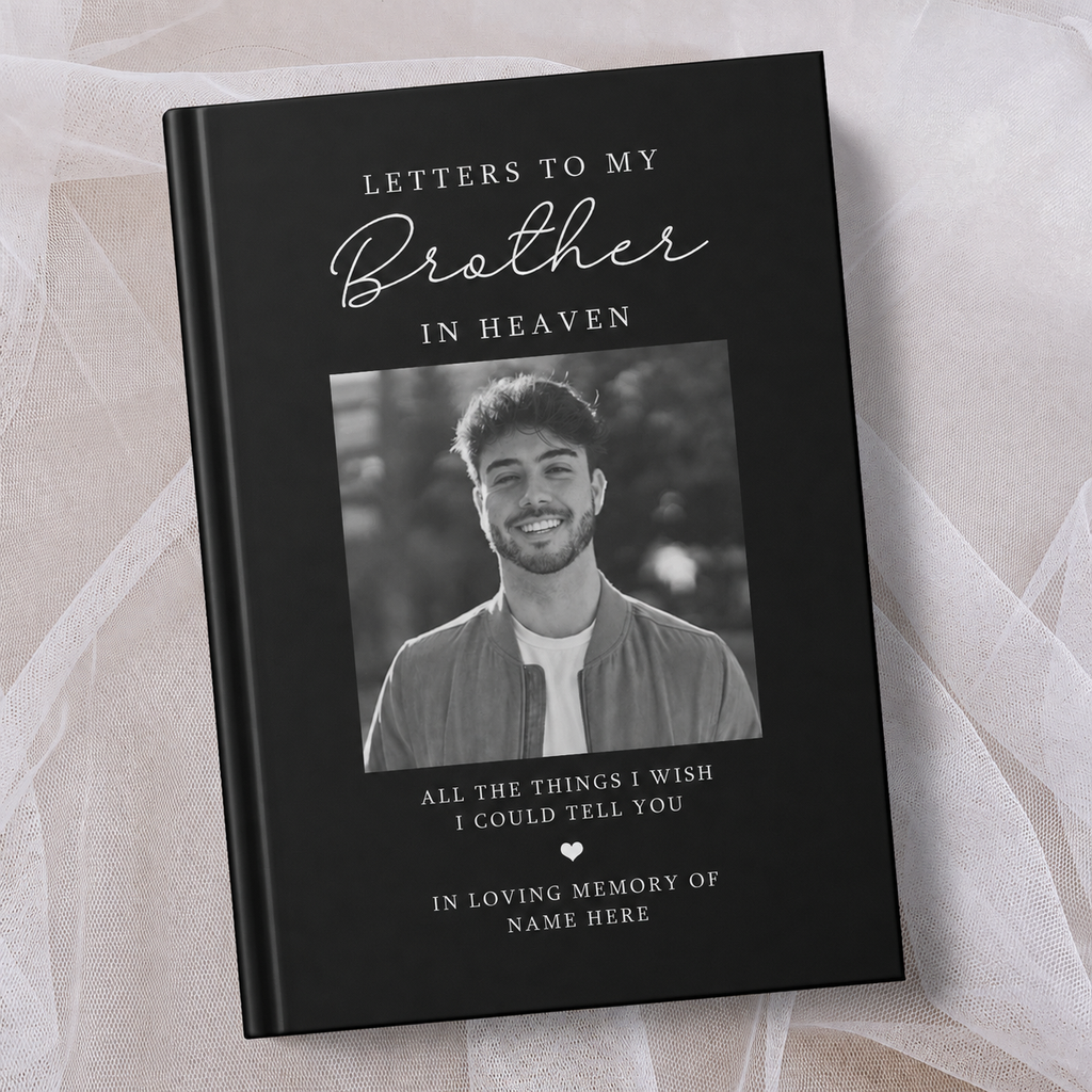 Personalised black hardcover memorial journal titled ‘Letters to My Brother in Heaven’, featuring a black and white photo of a smiling man on the cover with the words ‘All the things I wish I could tell you’ and ‘In loving memory’, personalised with a name