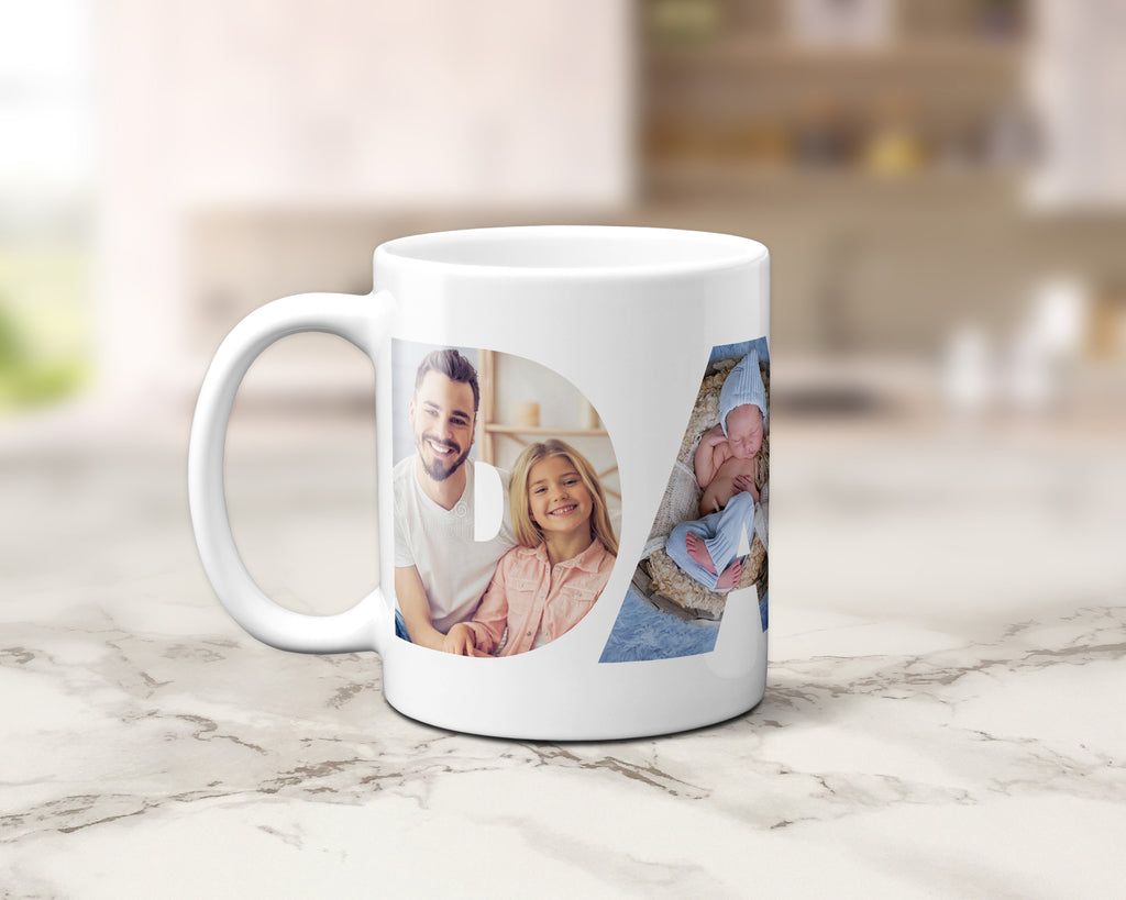 A white ceramic coffee mug with custom printed family photographs, displayed on a light marble countertop with a blurred kitchen background.