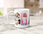 A white ceramic coffee mug with a custom photo collage within the letters spelling 'GRANDAD', set on a light marble countertop with a blurred kitchen background.