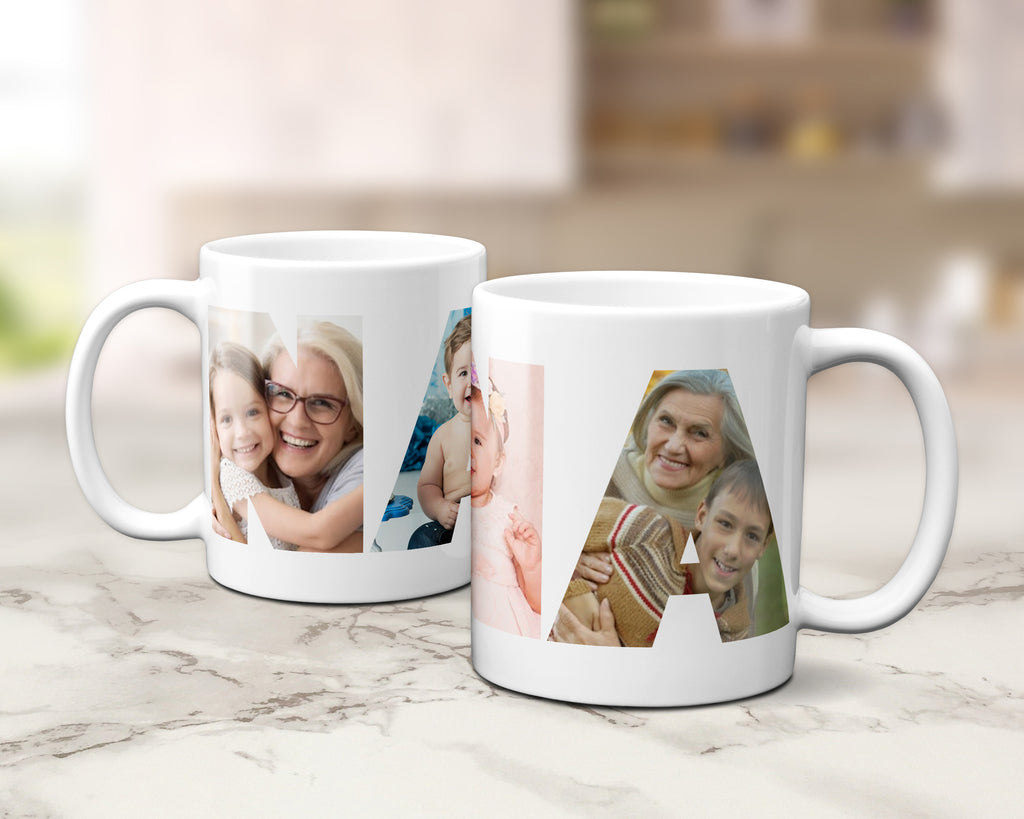 Two white ceramic mugs with custom family photo prints within the letters spelling NANNA displayed on a light marble countertop against a blurred kitchen background.