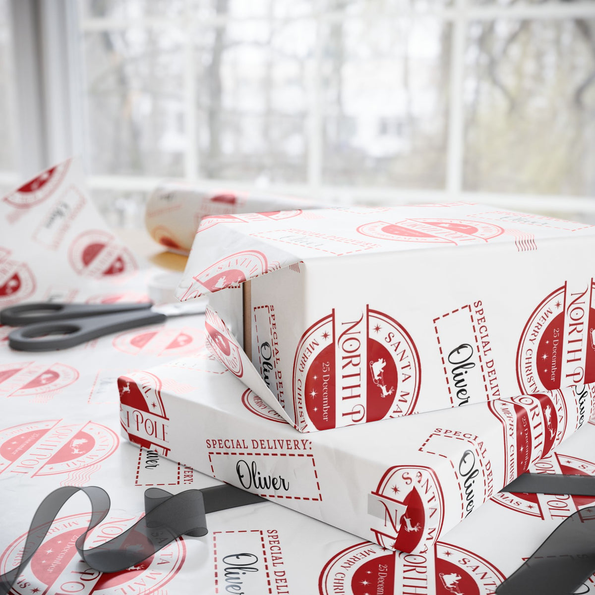 White wrapping paper with a red vintage Santa Claus stamp pattern, shown wrapped around gift boxes on a windowsill with scissors nearby.