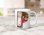 A ceramic mug with family photos within the letters spelling POP.