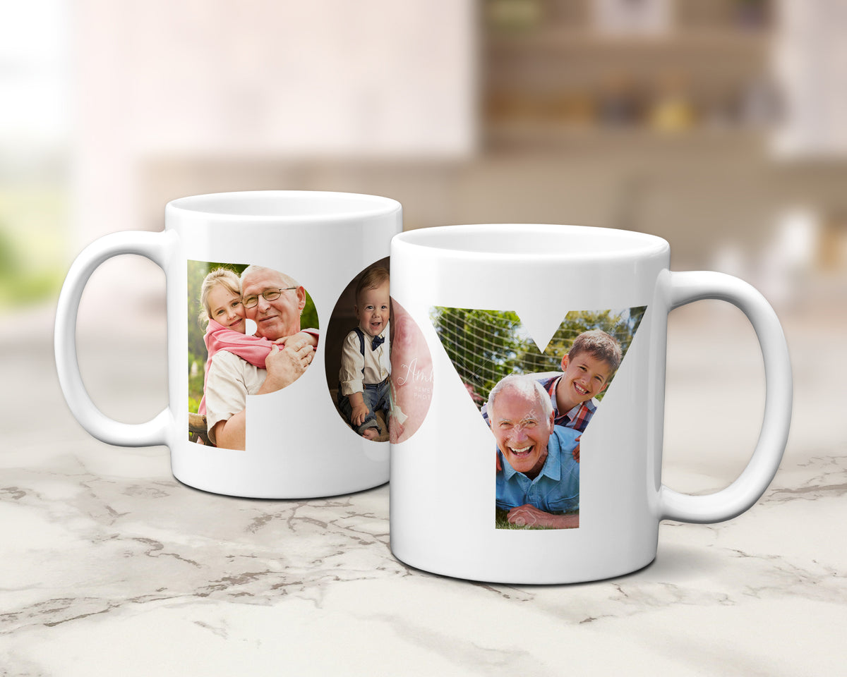 Two white ceramic mugs with custom printed family photos, displayed on a light marble countertop with a blurred kitchen background.