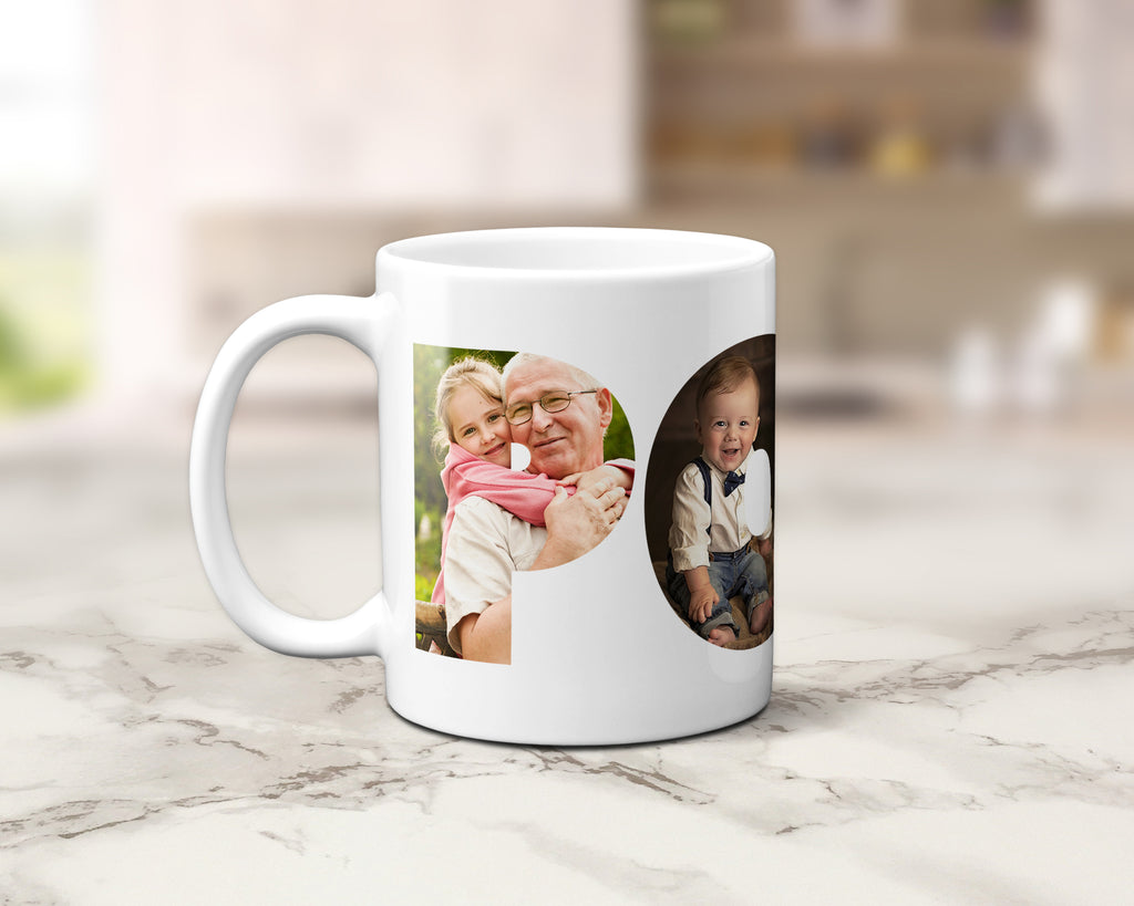 A white ceramic coffee mug with custom printed family photos, set on a light marble countertop with a blurred kitchen background.