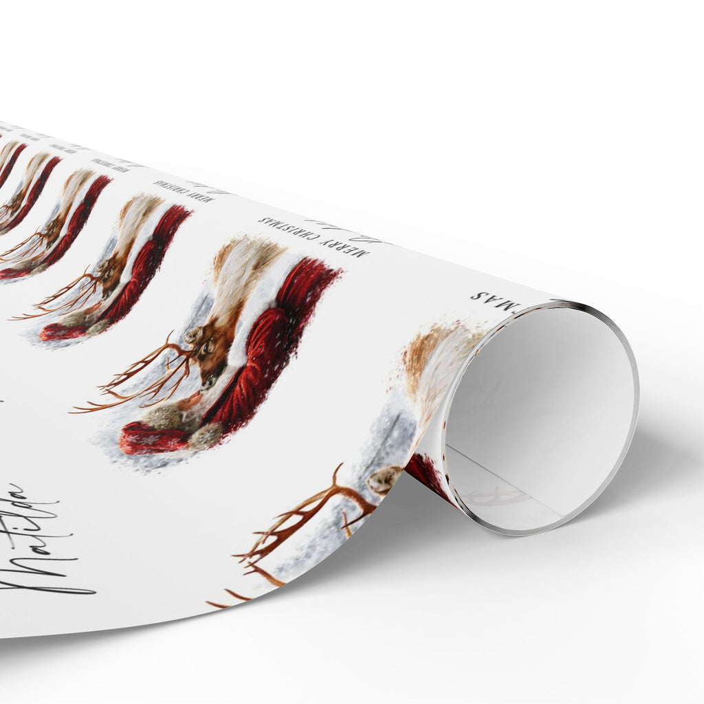 A roll of wrapping paper featuring a vintage style illustration of Santa and reindeer, on a white background, shown partially unrolled on a clean white surface.