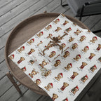 White wrapping paper with a repeating pattern of teddy bears in Santa hats and Christmas outfits, shown wrapped around a gift box on a round wooden tray over gray deck flooring.