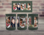 Three dark olive green can coolers arranged side by side on a wooden surface, with a matching rectangular card above them. The letters of the word "UNCLE" filled with family photos, set against a blurred brick wall background.