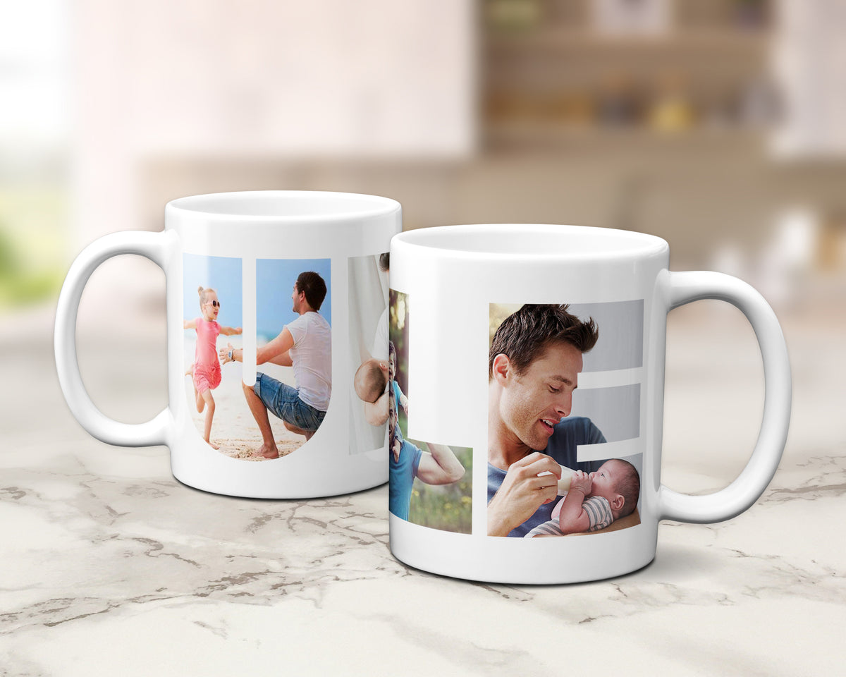 Two white ceramic mugs with custom printed family photos, displayed on a light marble countertop with a blurred kitchen background.