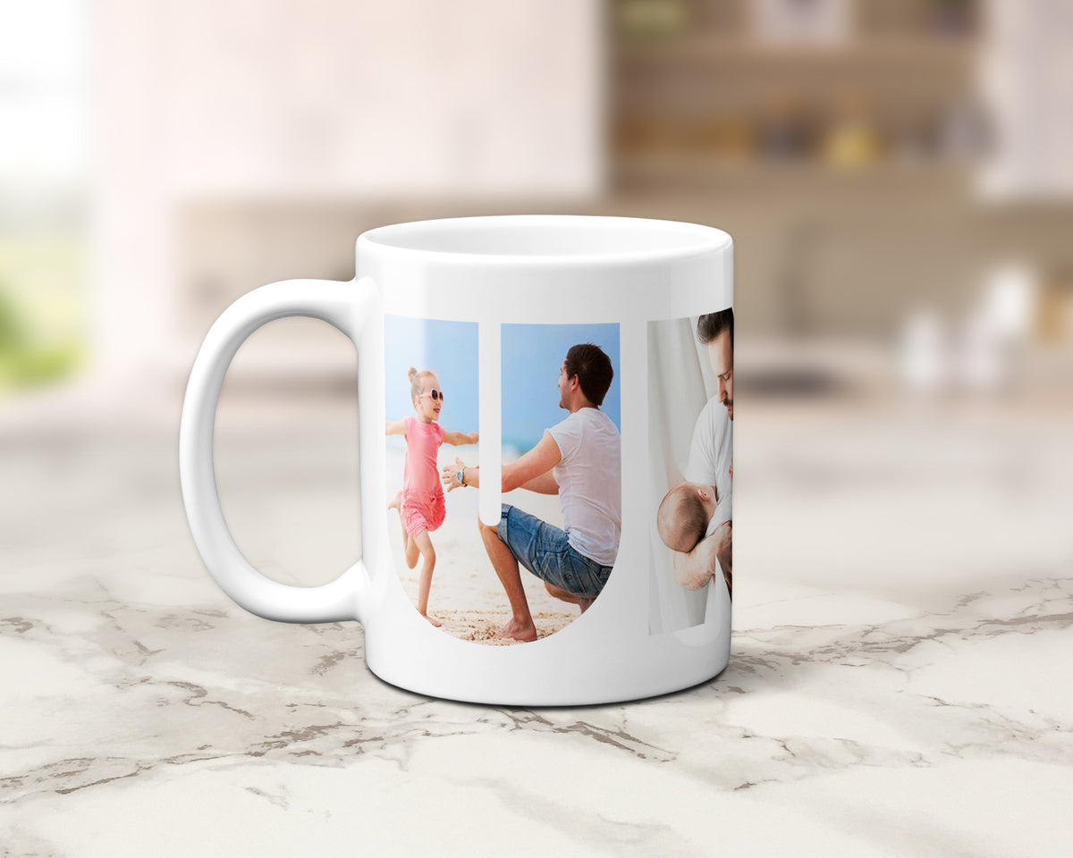 A white ceramic coffee mug with custom printed family photos, displayed on a light marble countertop with a blurred kitchen background.