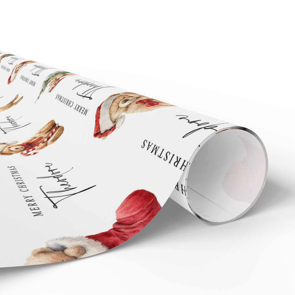 A roll of wrapping paper with a festive Christmas design, featuring watercolor illustrations of Christmas Teddy Bears, along with black script text on a white background.